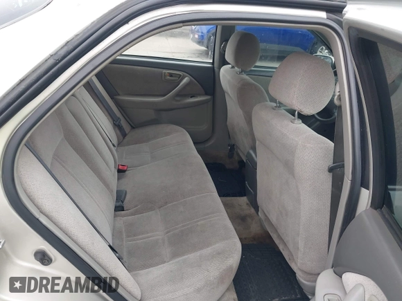 2001 Toyota Camry LE z VIN 4T1BF22K61U126600, wystawiony jako IAAI lot #42175093 z przebiegiem 294 276 mil mil oraz . Historia ofert i sprzedaży dostępna na DreamBid. Obrazek 8.