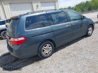 2006 Honda Odyssey EX-L with VIN 5FNRL38716B083630, listed as a IAAI auction lot 42017538 with 297,592 mi miles. Bid and sale history available at carsss.com. Image 4.