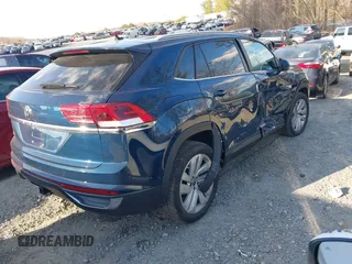2021 Volkswagen Atlas SE with VIN 1V2WE2CA4MC204010, listed as a IAAI auction lot 41252081 with 41,106 mi miles and . Bid and sale history available at DreamBid. Image 4.