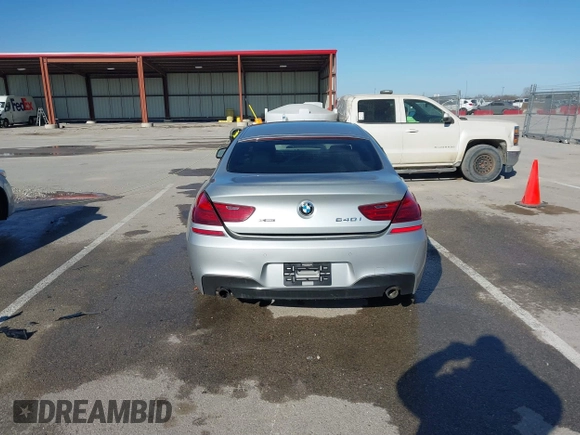 2015 BMW 6 Series 640i xDrive with VIN WBA6B8C52FD453433, listed as a IAAI auction lot 41805317 with 138,685 mi miles and . Bid and sale history available at carsss.com. Image 16.