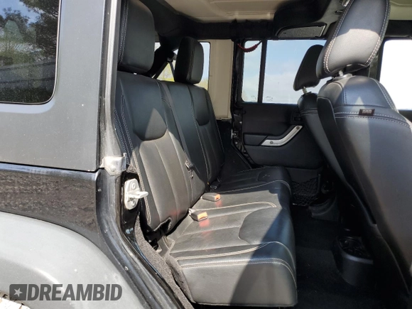 2015 Jeep Wrangler Unlimited Rubicon Hard Rock z VIN 1C4HJWFG5FL706170, wystawiony jako Copart lot #55442965 z przebiegiem Nie podano mil oraz Czysty tytuł • Clean title. Historia ofert i sprzedaży dostępna na DreamBid. Obrazek 11.