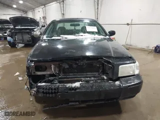 2009 Mercury Grand Marquis LS with VIN 2MEHM75V39X602084, listed as a IAAI auction lot 41615859 with 102,051 mi miles. Bid and sale history available at carsss.com. Image 12.