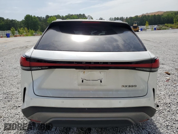 2023 Lexus RX 350 with VIN JTJCHMAA9P2005987, listed as a Copart auction lot 57335515 with 27,538 mi miles and Salvage title. Bid and sale history available at DreamBid. Image 6.