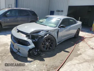 2020 Dodge Charger SXT with VIN 2C3CDXBG9LH200349, listed as a Copart auction lot 49615335 with 49,244 mi miles and Salvage Title. Bid and sale history available at carsss.com. Image 1.