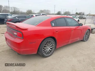 2014 Dodge Charger RT z VIN 2C3CDXCTXEH199291, wystawiony jako IAAI lot #41591362 z przebiegiem 113 452 mil mil oraz . Historia ofert i sprzedaży dostępna na DreamBid. Obrazek 4.