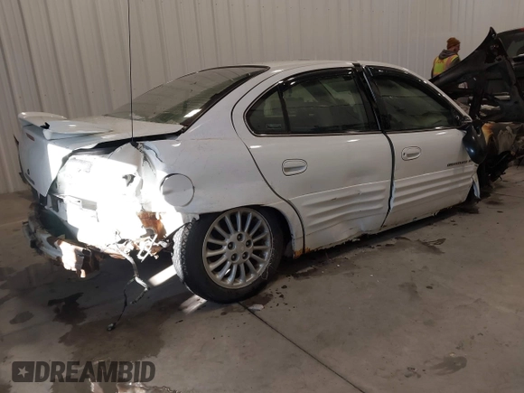 1999 Pontiac Grand Am SE2 with VIN 1G2NE52E4XM864232, listed as a IAAI auction lot 41321705 with 1 mi miles. Bid and sale history available at carsss.com. Image 4.