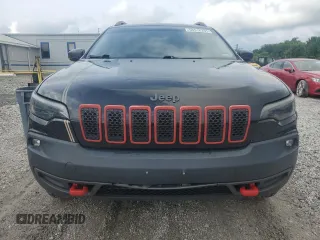 2019 Jeep Cherokee Trailhawk with VIN 1C4PJMBX9KD183116, listed as a Copart auction lot 58518265 with 124,258 mi miles and Salvage title. Bid and sale history available at DreamBid. Image 5.
