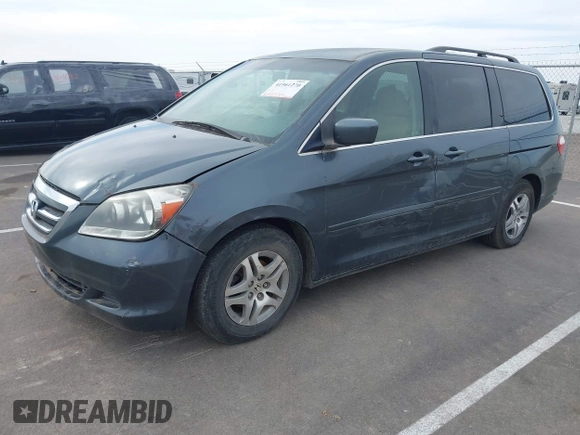 2005 Honda Odyssey EX with VIN 5FNRL38465B108123, listed as a IAAI auction lot 41961270 with 169,948 mi miles. Bid and sale history available at carsss.com. Image 2.