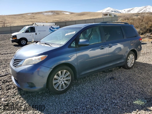 2014 Toyota Sienna LE with VIN 5TDJK3DC7ES081393, listed as a Copart auction lot 46713665 with 184,986 mi miles and Clean Title. Bid and sale history available at DreamBid. Image 1.