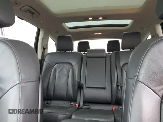 2014 Audi Q7 Premium Plus with VIN WA1LMAFE8ED015737, listed as a Copart auction lot 62099545 with 129,505 mi miles and Salvage title. Bid and sale history available at DreamBid. Image 10.