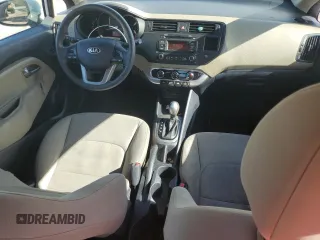 2015 Kia Rio LX with VIN KNADM4A38F6436457, listed as a Copart auction lot 68740994 with 87,474 mi miles and Salvage Title. Bid and sale history available at carsss.com. Image 8.