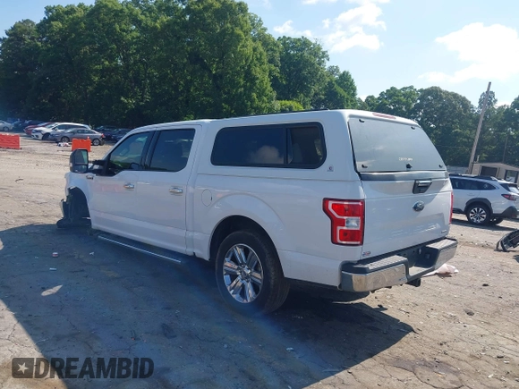 2019 Ford F-150 XL with VIN 1FTEW1C47KKE22590, listed as a IAAI auction lot 42418181 with 123,197 mi miles and . Bid and sale history available at DreamBid. Image 3.