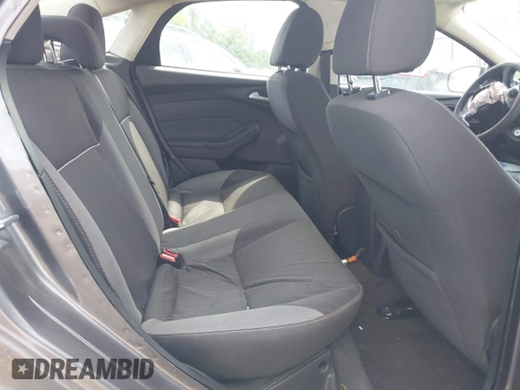 2013 Ford Focus SE z VIN 1FADP3F24DL104718, wystawiony jako IAAI lot #42206680 z przebiegiem Nie podano mil oraz . Historia ofert i sprzedaży dostępna na DreamBid. Obrazek 8.