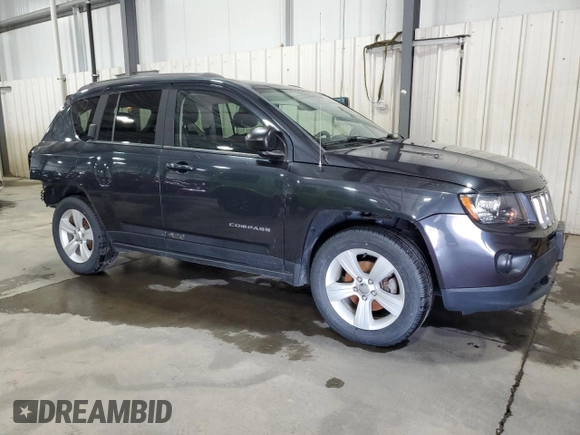2014 Jeep Compass Sport with VIN 1C4NJDBB3ED793061, listed as a Copart auction lot 50970625 with 146,113 mi miles and Salvage Title. Bid and sale history available at carsss.com. Image 4.