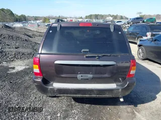 2004 Jeep Grand Cherokee with VIN 1J8GX48S24C266933, listed as a IAAI auction lot 41497122 with 200,899 mi miles and . Bid and sale history available at DreamBid. Image 17.