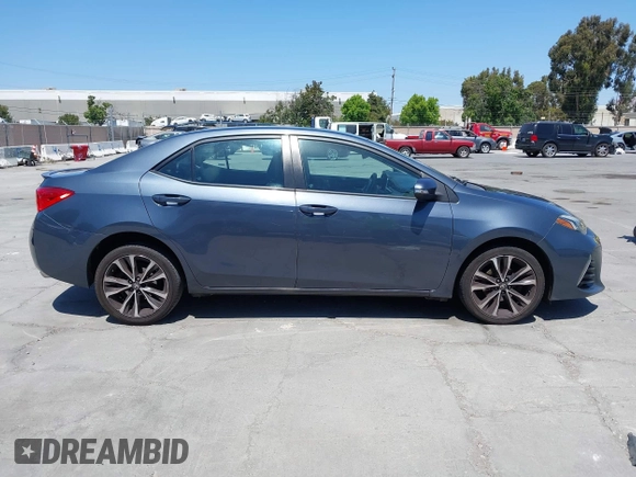 2017 Toyota Corolla L with VIN 5YFBURHE6HP575352, listed as a IAAI auction lot 42417810 with 248,626 mi miles and . Bid and sale history available at DreamBid. Image 13.