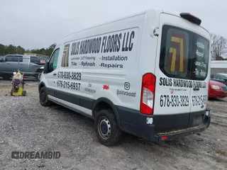 2021 Ford Transit Cargo with VIN 1FTBR1C87MKA12520, listed as a IAAI auction lot 41143999 with 88,943 mi miles and . Bid and sale history available at DreamBid. Image 3.