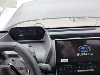 2024 Subaru Solterra Premium z VIN JTMABABA2RA056054, wystawiony jako IAAI lot #42018399 z przebiegiem 6 220 mil mil oraz . Historia ofert i sprzedaży dostępna na DreamBid. Obrazek 18.