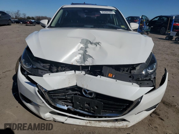 2017 Mazda 3 Grand Touring z VIN 3MZBN1M31HM138804, wystawiony jako Copart lot #45202295 z przebiegiem 80 428 mil mil oraz Szkoda całkowita • Salvage title. Historia ofert i sprzedaży dostępna na DreamBid. Obrazek 5.