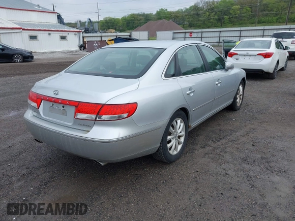 2007 Hyundai Azera SE with VIN KMHFC46FX7A182410, listed as a IAAI auction lot 42150993 with 146,627 mi miles and . Bid and sale history available at DreamBid. Image 4.