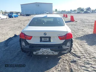 2014 BMW 4 Series 428i with VIN WBA3N3C53EF712057, listed as a IAAI auction lot 41868781 with 133,834 mi miles and . Bid and sale history available at DreamBid. Image 6.