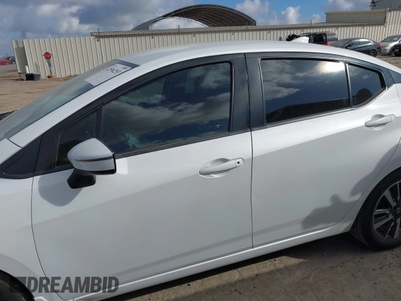 2021 Nissan Versa SV with VIN 3N1CN8EV3ML807318, listed as a IAAI auction lot 42596293 with 90,581 mi miles and . Bid and sale history available at DreamBid. Image 14.