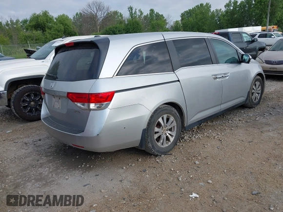2014 Honda Odyssey EX-L with VIN 5FNRL5H62EB101392, listed as a IAAI auction lot 42689945 with 289,242 mi miles and . Bid and sale history available at DreamBid. Image 4.