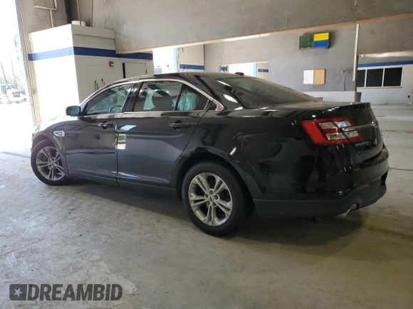 2014 Ford Taurus SEL z VIN 1FAHP2E84EG112877, wystawiony jako Copart lot #52612065 z przebiegiem 103 306 mil mil oraz Szkoda całkowita • Salvage title. Historia ofert i sprzedaży dostępna na DreamBid. Obrazek 2.