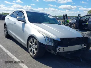 2014 Cadillac ATS Standard RWD with VIN 1G6AA5RXXE0105959, listed as a IAAI auction lot 42186256 with 103,146 mi miles and . Bid and sale history available at DreamBid. Image 1.