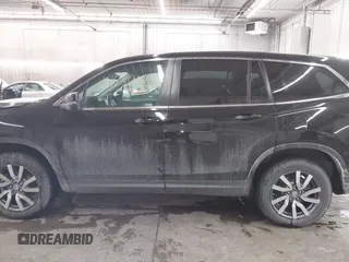 2021 Honda Pilot EX-L with VIN 5FNYF6H50MB092898, listed as a IAAI auction lot 41530673 with 28,505 mi miles. Bid and sale history available at carsss.com. Image 14.