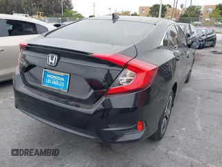 2016 Honda Civic Sedan EX-T with VIN 2HGFC1F34GH645220, listed as a IAAI auction lot 42043630 with 55,301 mi miles. Bid and sale history available at carsss.com. Image 4.