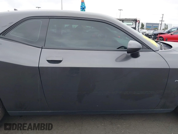 2015 Dodge Challenger R/T with VIN 2C3CDZAT5FH710566, listed as a IAAI auction lot 42042697 with 97,206 mi miles and . Bid and sale history available at DreamBid. Image 14.