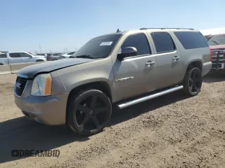 2007 GMC Yukon XL SLT z VIN 1GKFK16317J189987, wystawiony jako Copart lot #62029895 z przebiegiem 192 166 mil mil oraz Czysty tytuł • Clean title. Historia ofert i sprzedaży dostępna na DreamBid. Obrazek 1.