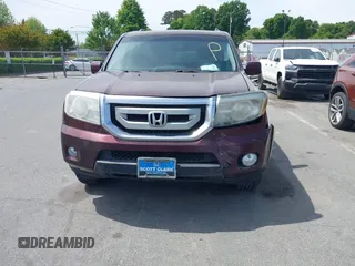 2011 Honda Pilot EX-L with VIN 5FNYF4H59BB090116, listed as a IAAI auction lot 42048811 with 158,857 mi miles and . Bid and sale history available at carsss.com. Image 11.