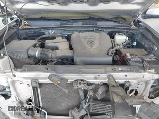 2018 Toyota Tacoma SR with VIN 3TMCZ5ANXJM146284, listed as a IAAI auction lot 42041525 with 103,143 mi miles and . Bid and sale history available at DreamBid. Image 10.