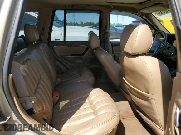 1999 Jeep Grand Cherokee Limited with VIN 1J4GW68N7XC581404, listed as a Copart auction lot 51533715 with 27,190 mi miles and Salvage Title. Bid and sale history available at carsss.com. Image 11.