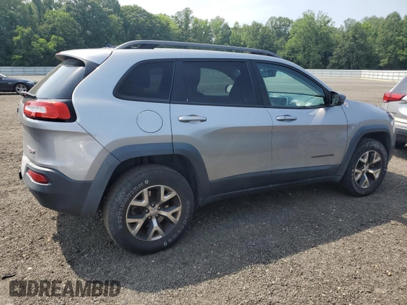 2015 Jeep Cherokee Trailhawk z VIN 1C4PJMBS5FW778852, wystawiony jako Copart lot #59107555 z przebiegiem Nie podano mil oraz Czysty tytuł • Clean title. Historia ofert i sprzedaży dostępna na DreamBid. Obrazek 3.