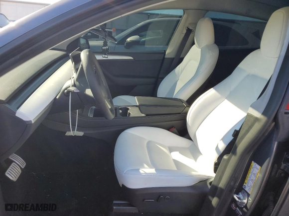 2023 Tesla Model Y Performance with VIN 7SAYGDEF0PF897600, listed as a Copart auction lot 45932795 with 11,325 mi miles and Salvage Title. Bid and sale history available at carsss.com. Image 7.