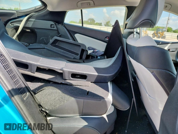 2017 Toyota Prius Plus with VIN JTDKARFP9H3030879, listed as a Copart auction lot 59861375 with 106,048 mi miles and Salvage title. Bid and sale history available at DreamBid. Image 11.