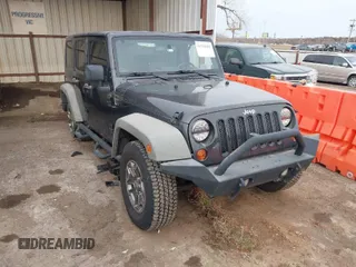 2010 Jeep Wrangler Unlimited Sport with VIN 1J4BA3H13AL125010, listed as a IAAI auction lot 41734482 with 183,773 mi miles. Bid and sale history available at carsss.com. Image 1.