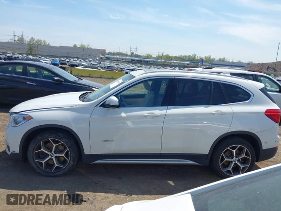 2018 BMW X1 xDrive28i with VIN WBXHT3C39J5F91912, listed as a IAAI auction lot 42099647 with 79,023 mi miles and . Bid and sale history available at DreamBid. Image 14.