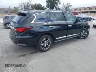 2020 Infiniti QX60 LUXE with VIN 5N1DL0MM5LC540433, listed as a IAAI auction lot 41894992 with 70,034 mi miles. Bid and sale history available at carsss.com. Image 4.