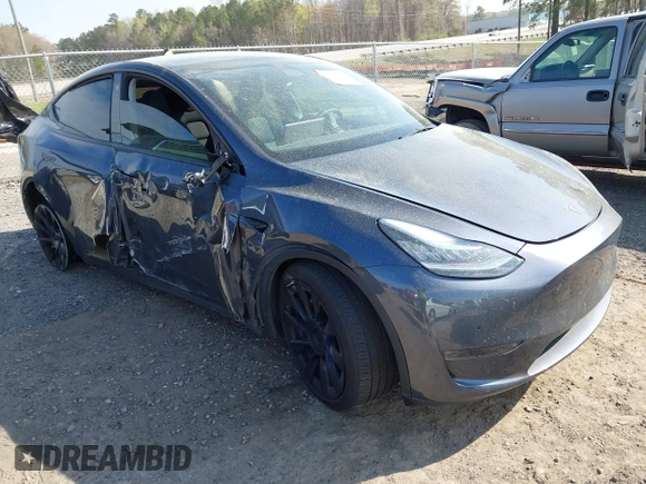2022 Tesla Model Y Long Range z VIN 7SAYGDEE7NA006476, wystawiony jako IAAI lot #41894606 z przebiegiem 63 380 mil mil oraz . Historia ofert i sprzedaży dostępna na DreamBid. Obrazek 1.