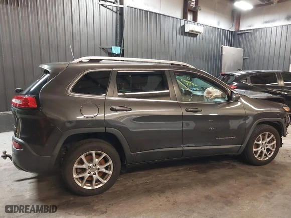 2017 Jeep Cherokee Latitude with VIN 1C4PJLCS1HW592799, listed as a IAAI auction lot 41162001 with 92,773 mi miles. Bid and sale history available at carsss.com. Image 12.