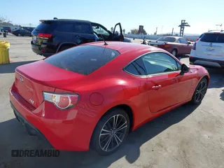 2013 Scion FR-S with VIN JF1ZNAA10D2708478, listed as a IAAI auction lot 42093210 with 172,034 mi miles. Bid and sale history available at carsss.com. Image 4.