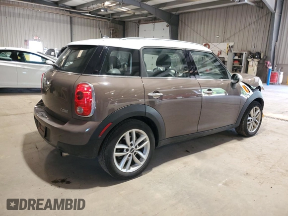 2012 MINI Countryman with VIN WMWZB3C52CWM01672, listed as a Copart auction lot 56064265 with 97,267 mi miles and Salvage Title. Bid and sale history available at DreamBid. Image 3.