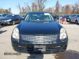 2004 Infiniti G35 w/Leather with VIN JNKCV51E94M609249, listed as a IAAI auction lot 41911426 with 200,461 mi miles and . Bid and sale history available at DreamBid. Image 6.