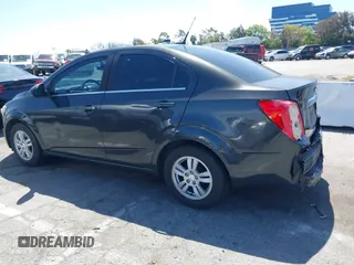 2014 Chevrolet Sonic LT with VIN 1G1JC5SB7E4146444, listed as a IAAI auction lot 42014386 with 85,122 mi miles and . Bid and sale history available at DreamBid. Image 14.