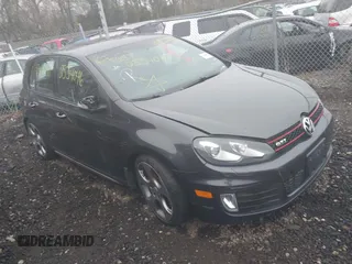 2011 Volkswagen GTI z VIN WVWGV7AJXBW041753, wystawiony jako IAAI lot #42095961 z przebiegiem Nie podano mil oraz . Historia ofert i sprzedaży dostępna na DreamBid. Obrazek 1.