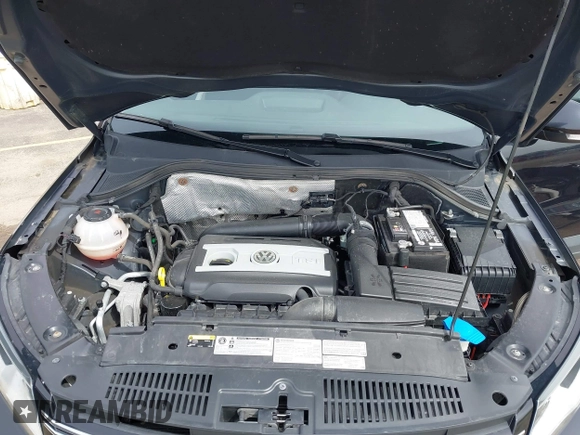2018 Volkswagen Tiguan with VIN WVGBV7AX3JK002325, listed as a IAAI auction lot 41960059 with 57,619 mi miles and . Bid and sale history available at DreamBid. Image 10.